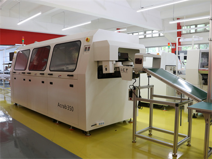 Mesin solder ICT Wave dengan wave unloader